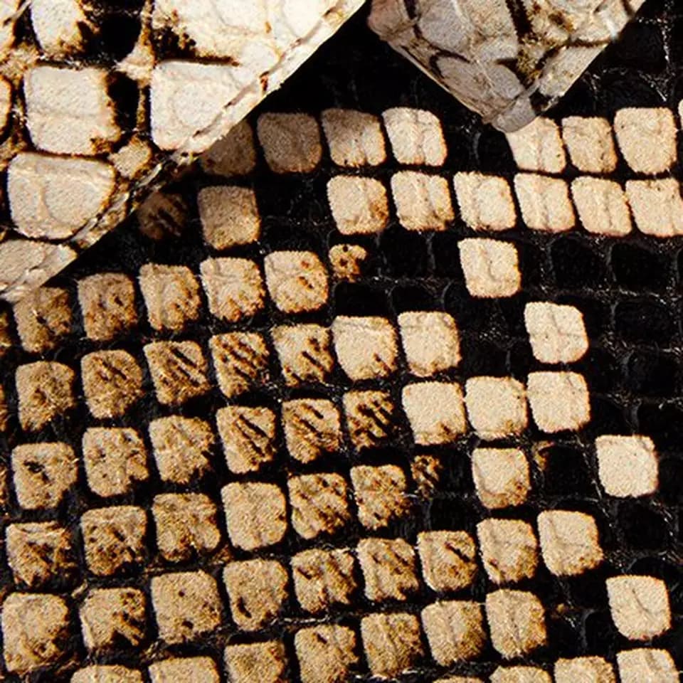 Beige and black printed boa leather shoe material swatch
